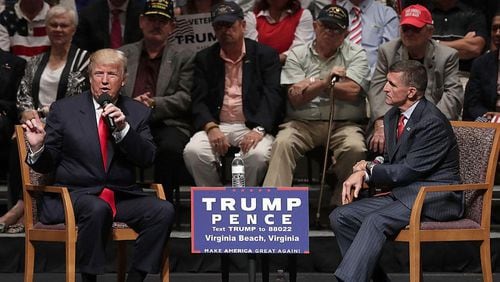 FILE PHOTO: Republican presidential nominee Donald Trump (L) speaks during a campaign event September 6, 2016 in Virginia Beach, Virginia. Trump participated in a discussion with retired Army Lieutenant General Michael Flynn (R).  (Photo by Alex Wong/Getty Images)