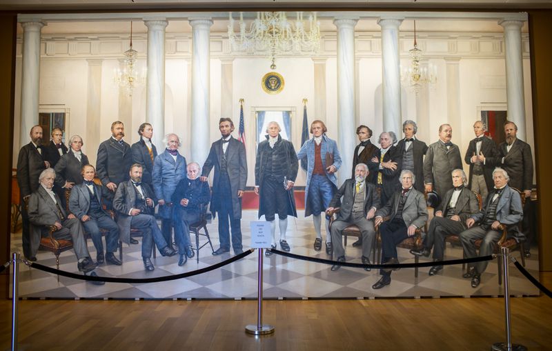 Years after completing the painting of the 20th century presidents, Rossin added this equally monumental canvas, creating life-sized portraits of all the 19th century presidents, plus George Washington and John Adams. Rossin worked on this 13-by-20-foot painting "in situ," in a gallery at the Booth Western Art Museum, as visitors watched his progress. (Rebecca Wright for the Atlanta Journal-Constitution)