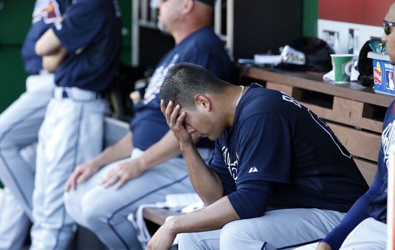 Manny Banuelos gave up seven runs (six earned) and recorded only six outs Sunday in the Braves' 12th consecutive loss. His expression after leaving the game captured the essence of the Braves' crumbling season. (AP photo)