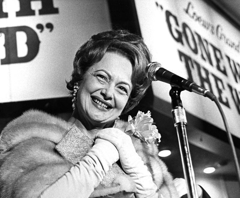 Olivia de Havilland, lone survivor of the top stars of the movie, "Gone With the Wind," speaks to a crowd attending Wednesday night's new premiere of the fabulous movie. She called it a "joyful reunion." The movie was first premiered in Atlanta Dec. 15, 1939.