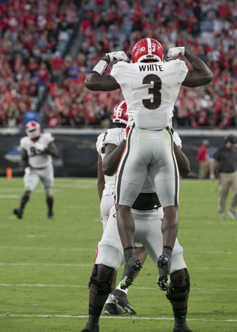 10/30/21 - Jacksonville -  Georgia Bulldogs running back Zamir White (3) celebrates after his 4th quarter touchdown run during the second half of the annual NCCA  Georgia vs Florida game at TIAA Bank Field in Jacksonville. Georgia won 34-7.  Bob Andres / bandres@ajc.com