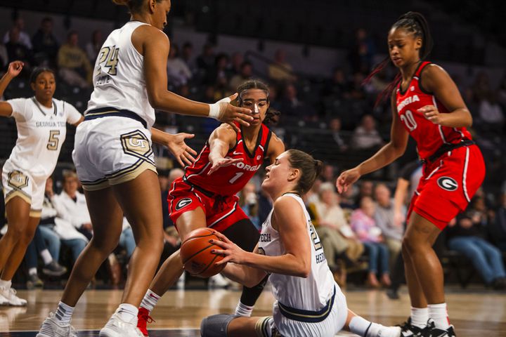 Georgia Tech's Nerea Hermosa dives for the ball during a women's basketball game against Georgia on Sunday in Atlanta. (CHRISTINA MATACOTTA / FOR THE ATLANTA JOURNAL-CONSTITUTION)
