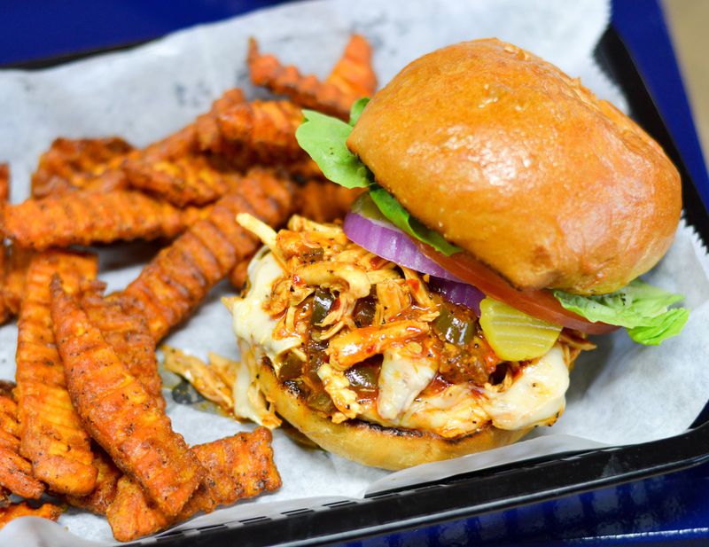 Sliders Burger Joint serves the Big Flaming Jalapeno Chicken Joint, a very spicy and flavorful pulled-chicken sandwich. CONTRIBUTED BY HENRI HOLLIS