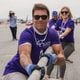 Tom Brady joins Delta employees to pull a Boeing 757 to raise money for The American Cancer Society during the Delta Jet Drag on Friday, April 26, 2024, in Atlanta, at Delta Air Lines Technical Ops. (Atlanta Journal-Constitution/Jason Allen)