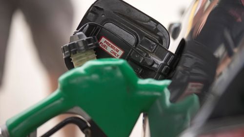 Gas prices typically hit a low in mid-winter — and here we are. By mid-month, prices will likely start rising until late May. (ALYSSA POINTER/ATLANTA JOURNAL-CONSTITUTION)