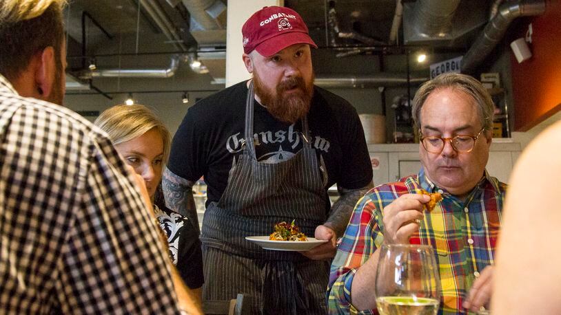 Kevin Gillespie serves a dish for the dinner crowd May 8, 2018 at Gunshow in Atlanta. Gillespie was recently diagnosed with renal cancer and will have to undergo treatment. (REANN HUBER/REANN.HUBER@AJC.COM)