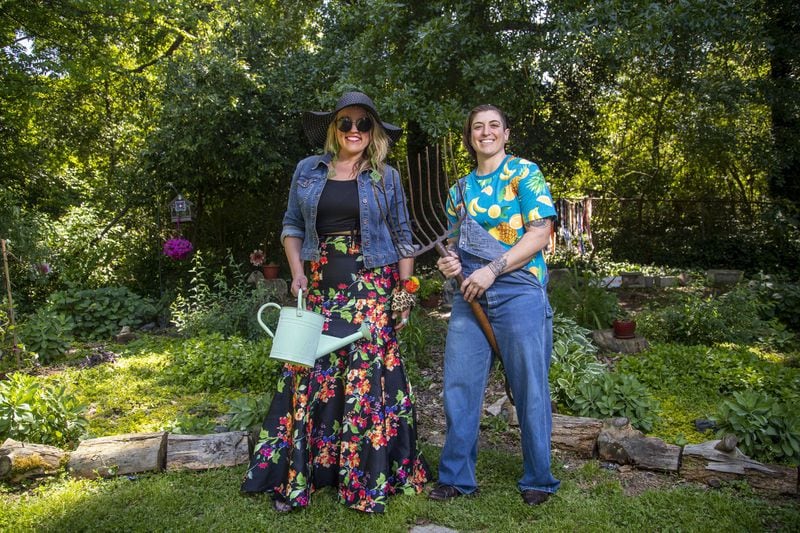 Jackie McCleskey (left) and Tia Wowk have found that spending quality time together in their backyard has been a pleasant experience. Activities include gardening, fun art projects and enjoying the weather, all from the comfort of home. (ALYSSA POINTER / ALYSSA.POINTER@AJC.COM)