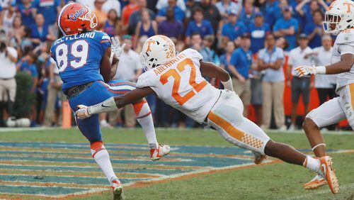 Florida's Tyrie Cleveland hauls in a 63-yard touchdown as time expires to give the Gators 26-20 win over Tennessee at Florida's Ben Hill Griffin Stadium in Gainesville. Tennessee's Micah Abernathy was the defender beaten on the Hail Mary play. (Scott Halleran/Getty Images)