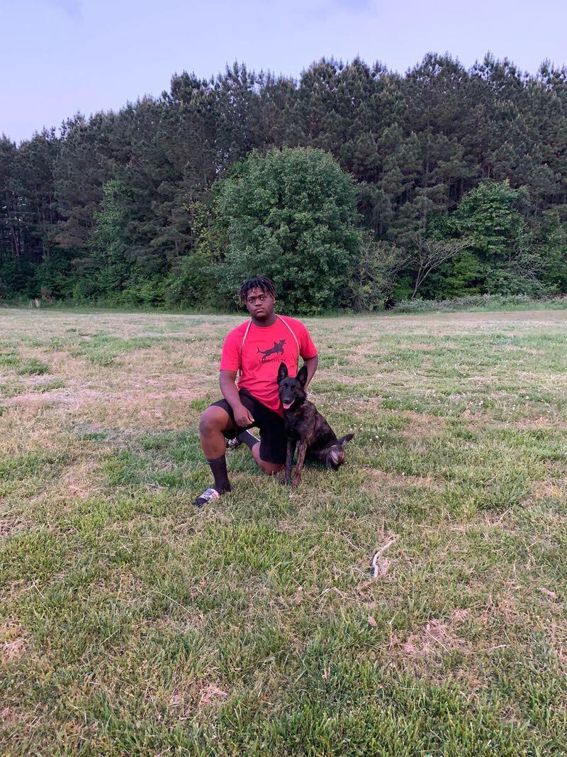 Dog trainer Bryce Sanders offers tips to help pets adjust to their owners going back into the office. Here Sanders is with his Dutch shepherd, Pix. (Courtesy of Bryce Sanders)