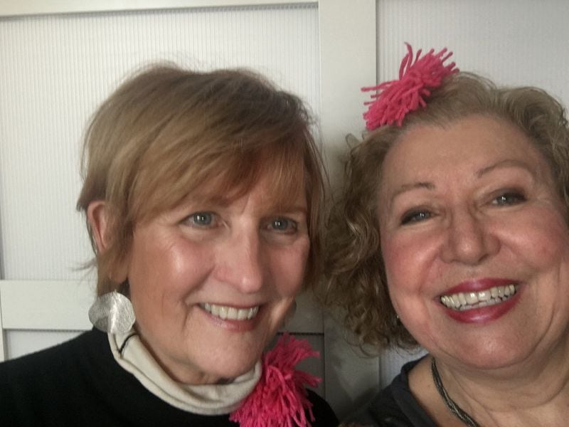 Pat Harris (left) and Beverly Molander show off the pink pompoms they made to wear in the Women’s March on Washington on Saturday. The women will attend with 18 of their girlfriends. CONTRIBUTED