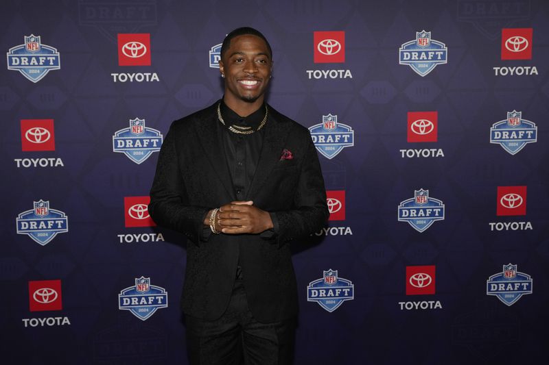 Toledo cornerback Quinyon Mitchell poses on the red carpet ahead of the first round of the NFL football draft, Thursday, April 25, 2024, in Detroit. (AP Photo/Carlos Osorio)