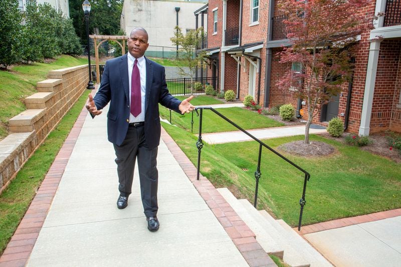 Rod Mullice talks about the properties he's developed and built outside one of his apartment complexes in College Park Sunday, August 15, 2021. STEVE SCHAEFER FOR THE ATLANTA JOURNAL-CONSTITUTION