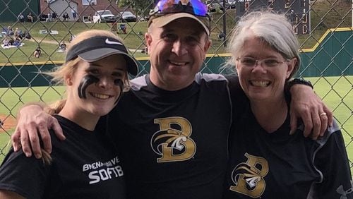 Kali Shultz (left) with her parents, Kevin and Belinda Shultz of Walnut Grove, after her first softball game at Brenau University. Kevin Shultz said his daughter is stable but needs our prayers. CONTRIBUTED