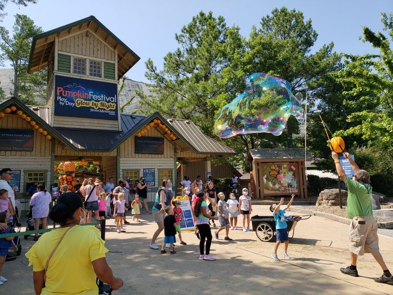 Kids at Stone Mountain Park were mesmerized by bubbles on Labor Day weekend, Sunday, Sept. 6, 2020. MATT KEMPNER / AJC