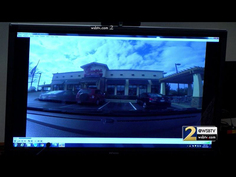 In this GoPro camera video, Cobb County lead detective Phil Stoddard demonstrates the route taken by Justin Ross Harris on the day that Cooper died. In this view, the vehicle is leaving the Chick-fil-A that Harris and Cooper ate that morning. The video was shown to the jury during murder trial of Justin Ross Harris at the Glynn County Courthouse in Brunswick, Ga., on Monday, Oct. 24, 2016. (screen capture via WSB-TV)