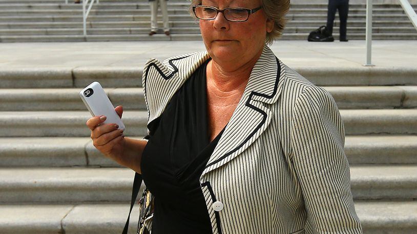 090314 ATLANTA: Former DeKalb County Commissioner Elaine Boyer makes no comment leaving federal court after her arraignment hearing for bilking taxpayers out of thousands of dollars through a kickback scheme on Wednesday, Sept. 3, 2014, in Atlanta. CURTIS COMPTON / CCOMPTON@AJC.COM