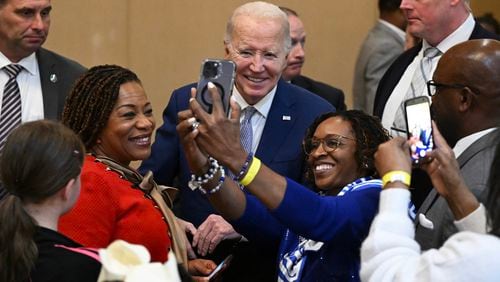 President Joe Biden takes photos with attendees after speaking at Brookland Baptist Church’s banquet and conference center last week West Columbia, South Carolina. In 2020, one out of every two voters in South Carolina’s Democratic primary was Black or nonwhite, so the state is seen as a way to test Biden's strengths and weaknesses with Black voters there and in other Southern states. (Kenny Holston/The New York Times)