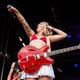 Nashville's Winona Fighter, with frontwoman Coco leading the charge, was the second act to take the Ponce de Leon stage at Shaky Knees on Friday, May 3, 2024. (RYAN FLEISHER FOR THE ATLANTA JOURNAL-CONSTITUTION)