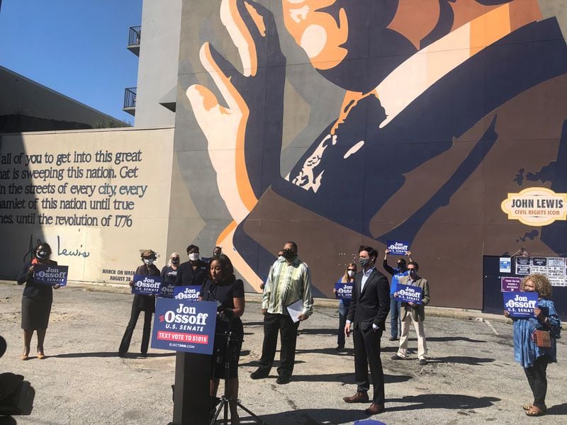 Democratic U.S. Senate candidate Jon Ossoff met Monday in downtown Atlanta with supporters who were social distancing and wearing masks in caution against the coronavirus.