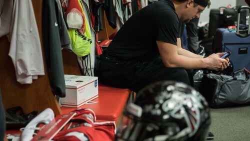 Atlanta Falcons tackle Ryan Schraeder sits in the locker room at the team’s practice facility, Tuesday, Feb. 7, 2017, in Flowery Branch, Ga.