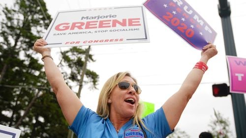 Marjorie Greene, of Milton, and candidate for congress in the sixth district, participates in a "Stop Impeachment Now" rally outside the office of Rep. Lucy McBath on Wednesday, October 9, 2019, in Sandy Springs. (Elijah Nouvelage for The Atlanta Journal-Constitution)