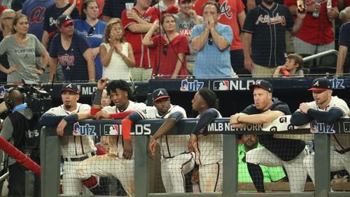 Atlanta Braves players react during their loss to the St. Louis Cardinals in the ninth inning during Game 1 of the NLDS against the St. Louis Cardinals at SunTrust Park Thursday, October 3, 2019 in Atlanta. The Cardinals won 7-6. The Braves lost 7-6 to the Cardinals. (JASON GETZ/SPECIAL TO THE AJC)