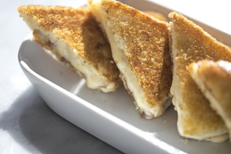 Cooks & Soldiers, which came up with the Iberico Ham and Black Truffle and American White Cheddar Bikini, will be at the 2020 Atlanta Grilled Cheese Festival, whose date was moved to Sept. 12. CONTRIBUTED BY HEIDI GELDHAUSER