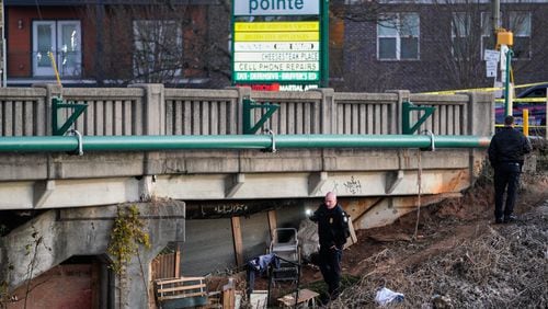 Atlanta police have blocked lanes of Cheshire Bridge Road near Faulkner Road early Wednesday after a fire broke out under the railway overpass.