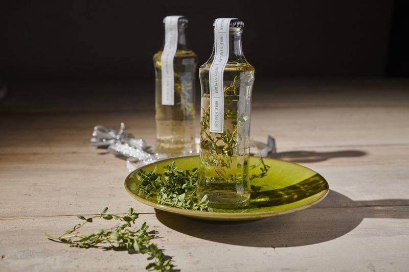 You might want to tell your gift recipient that Herb-Infused Vinegar becomes more flavorful with time. (Greg Rannells for The Atlanta Journal-Constitution)
