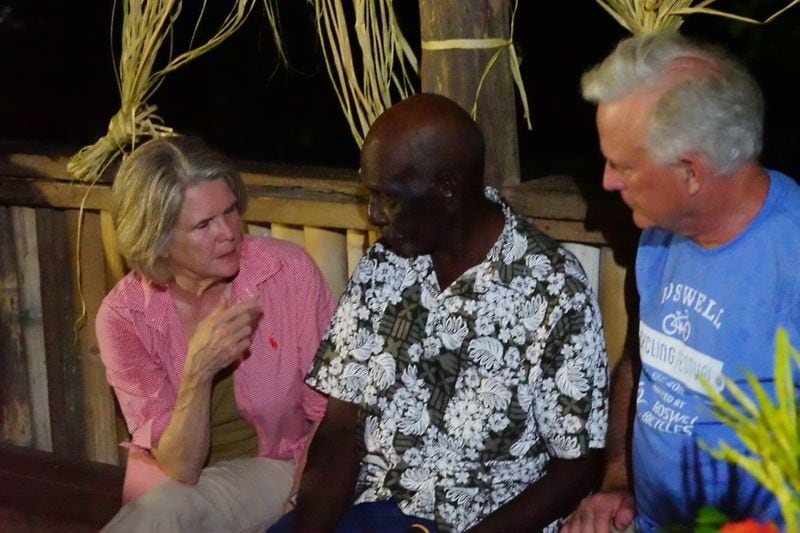 Roy Kellosi (center) was 10 years old when American airman Ben King ditched his P-38 in the South Pacific and paddled a rubber raft to Mono Island. Kellosi, now 83, greeted King’s niece Mary Jo Wood (left) and nephew Jere Wood (right) when they traveled back to the island recently to retrace the airman’s journey. CONTRIBUTED BY MARY JO WOOD