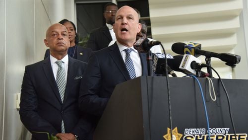 DeKalb County Sheriff Jeffrey Mann (left) stands next to his attorney Noah Pines as he speaks during a press conference at DeKalb County Sheriff Office on Friday, May 12, 2017. Mann, speaking through his lawyer, apologized to his constituents and said he plans to continue serve in his job. HYOSUB SHIN / HSHIN@AJC.COM