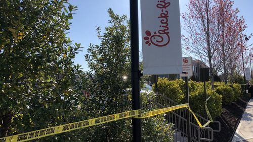 Crime-scene tape was in place Thursday at a Chick-fil-A in Alpharetta.