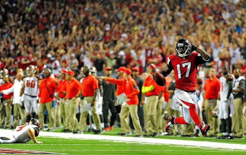 Devin Hester pays homage to Falcons Hall of Famer Deion Sander as he returns a punt 62-yards for a touchdown - marking his 20th return for a touchdown and breaking the all-time record set by Sanders. (Scott Cunningham/Getty Images)