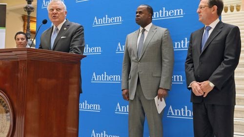 October 26, 2016 - Atlanta - Gov. Nathan Deal (left) Atlanta Mayor Kasim Reed and Anthem Senior Vice President and Chief Information Officer Tom Miller make the announcement. Health care giant Anthem plans an 1,800-job expansion in downtown Atlanta, company and political leaders said Wednesday. The parent of Blue Cross/Blue Shield of Georgia will take space in the Bank of America Plaza tower just north of downtown. Jobs involved will be mainly in software development. BOB ANDRES /BANDRES@AJC.COM