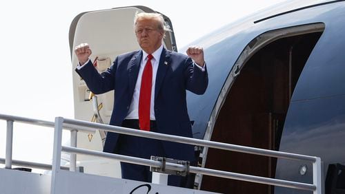 Former President Donald Trump arrives at Hartsfield-Jackson International Airport on Wednesday.