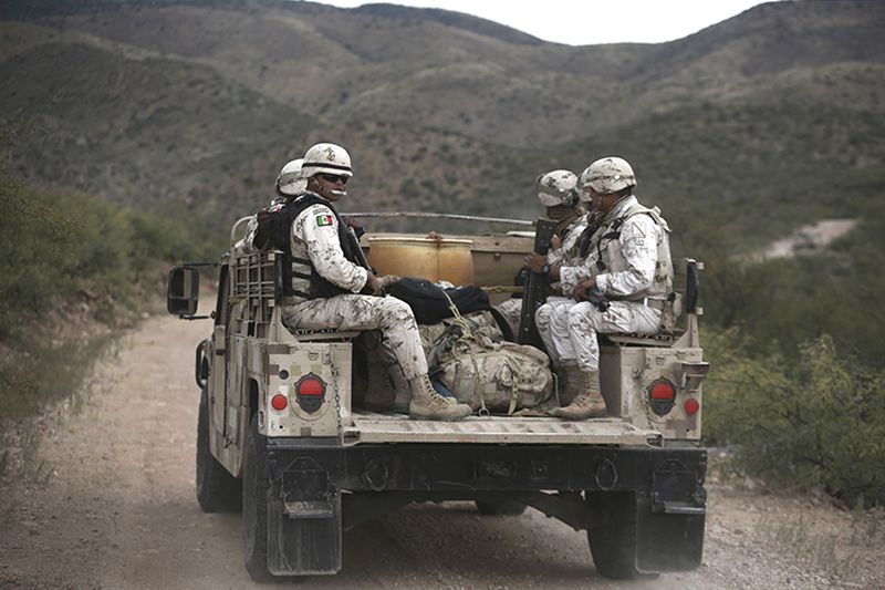 Mexican national guardsmen patrol near Bavispe, at the Sonora-Chihuahua border, Mexico, on Wednesday. When drug cartel gunmen opened fire on American women and children in northern Mexico on Monday, the Mexican Army, the National Guard and Sonora state police were not there to protect them. It took them about eight hours to arrive.