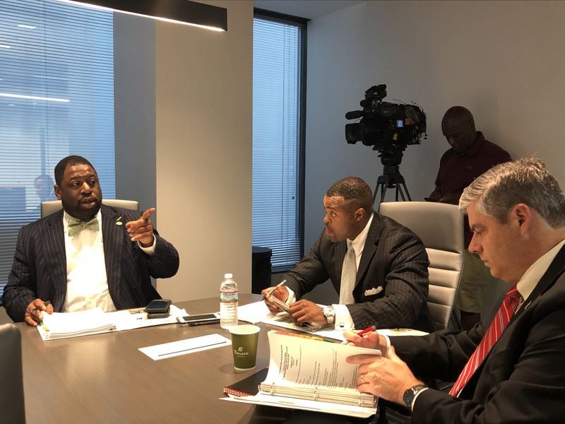 Fulton County Commissioner Marvin Arrington, left, speaks as Atlanta Fulton County Recreation Authority Chairman William K. Whitner and Fulton Commissioner Bob Ellis listen during a meeting of the authority’s board in August 2018. Arrington and Ellis, who are also members of the recreation authority board, debated potential conflicts of interest involving the authority and Gulch redevelopment Wednesday, Sept. 5, 2018, during a county commission hearing. J. Scott Trubey/STRUBEY@AJC.COM