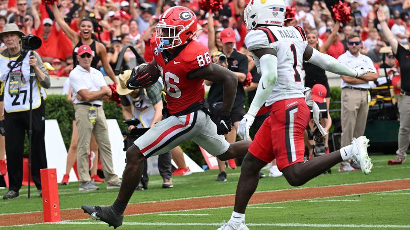 Georgia's wide receiver Dillon Bell (86) scores a touchdown during the first half in an NCAA football game at Sanford Stadium, Saturday, September 9, 2023, in Athens. (Hyosub Shin / Hyosub.Shin@ajc.com)