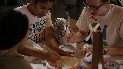 Atlanta students work on an experiment during the launch of the 2018 Google Science Fair on Thursday at the King Plow Arts Center.