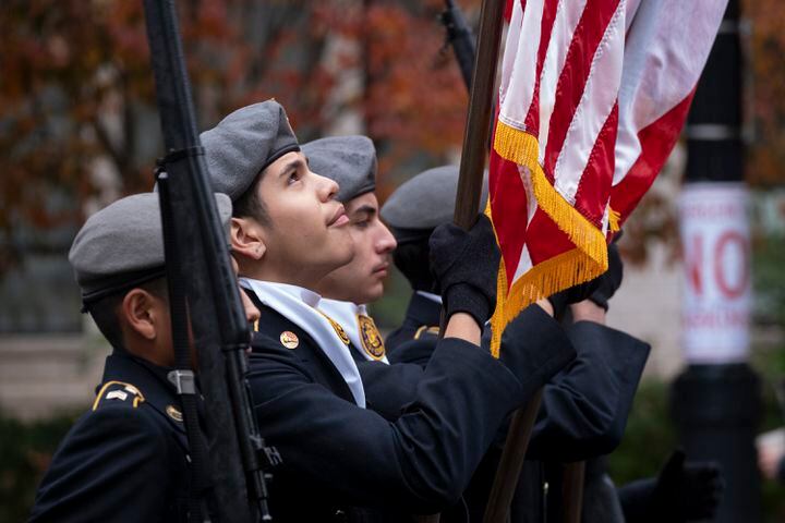 The Chamblee Charter High School Army JROTC color guard lines up before the beginning of the 42nd annual Georgia Veterans Day Parade in Midtown Atlanta on Saturday, Nov. 11, 2023.   (Ben Gray / Ben@BenGray.com)