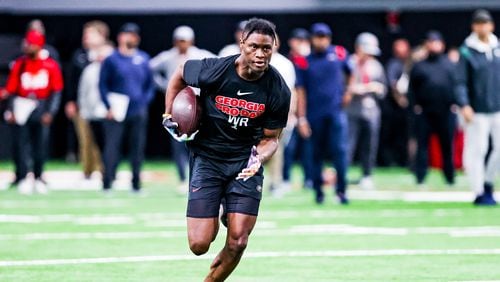 Former Georgia receiver George Pickens turns upfield after catching a pass from quarterback Carson Beck during his workout for NFL scouts at UGA Pro Day on Wednesday in the Payne Indoor Athletic Facility in Athens. (Photo by Tony Walsh/UGA Athletics)