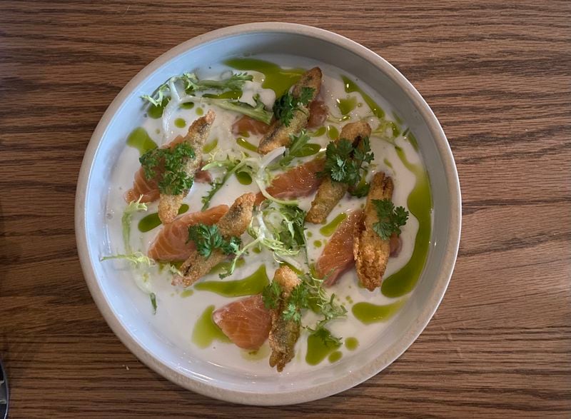 Alici offers a variety of crudo dishes. Pictured is the trota iridea, featuring steelhead trout and fried anchovies. Ligaya Figueras/ligaya.figueras@ajc.com