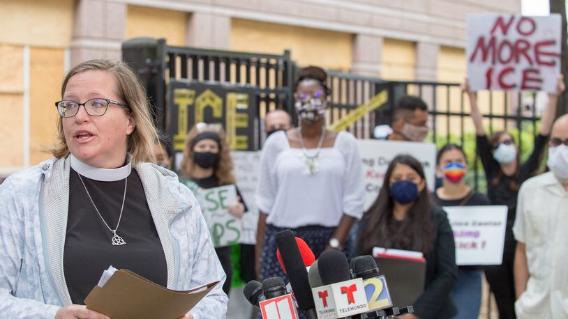 The Rev. Leann Culbreath speaks during a protest that followed a whistleblower's complaint about unwanted gynecological procedures on women in Immigration and Customs Enforcement custody at the Irwin County Detention Center in Ocilla. JENNI GIRTMAN/For the AJC