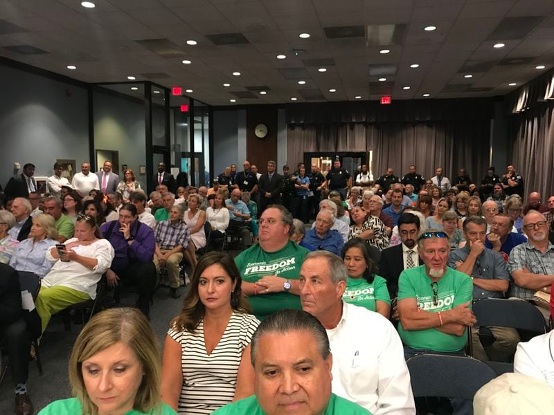 more than a hundred Cobb residents turned out for the county commission vote on the millage rate (Meris Lutz/AJC)