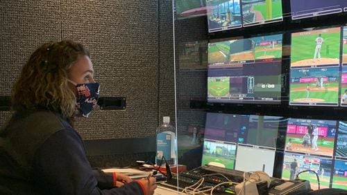 Gretchen Kaney, producer of Braves telecasts on Fox Sports South and Fox Sports Southeast, is at work in the production truck at a recent game.