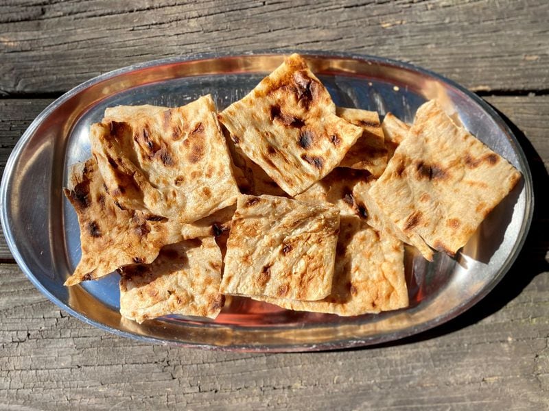 Taaj Kabob & Grill is the only place in town that makes the Persian flatbread sangak; people drive from far and wide to buy the $3.50 loaf. Wendell Brock for The Atlanta Journal-Constitution