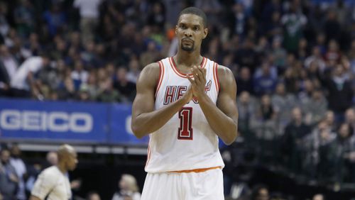 Miami Heat forward Chris Bosh (1) reacts to a call during the second half of an NBA basketball game against the Dallas Mavericks Wednesday, Feb. 3, 2016, in Dallas. (AP Photo/LM Otero)