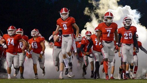 The Allatoona Buccaneers take the field before the start of  their game against Hapeville Charter Friday, October 12, 2018 at Allatoona High School. PHOTO/Daniel Varnado