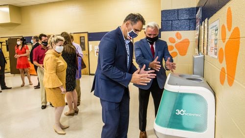 "Iggy", 30e Scientific's first aqueous ozone hand washing station is installed in the Bryant Elementary School cafeteria in Mableton.  Wednesday, Oct 21, 2020.  (Jenni Girtman for The Atlanta Journal-Constitution)