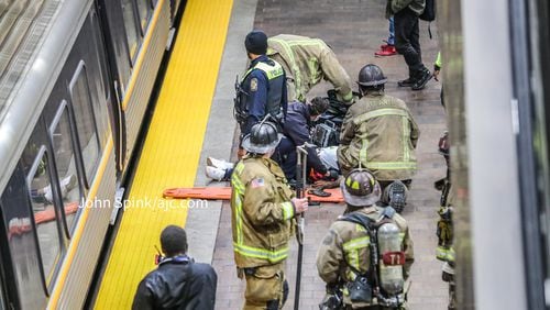 MARTA reported minor delays Thursday morning as crews worked to remove a man from the eastbound track at the Georgia World Congress Center/CNN Center station.